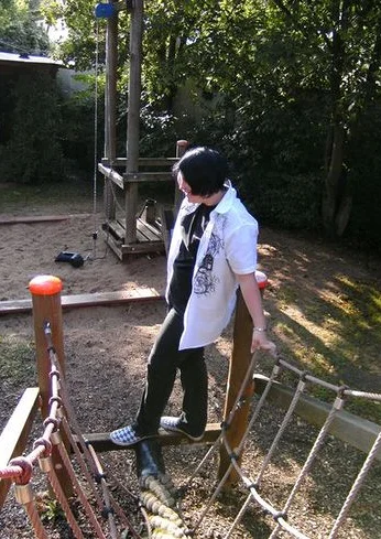 Cosplay-Cover: Sasuke schoolstyle