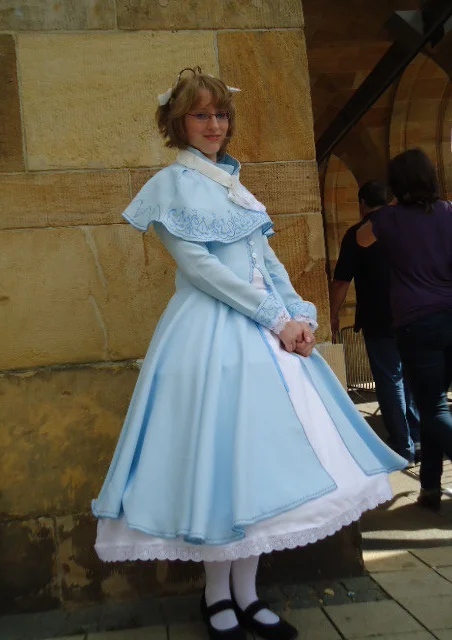 Cosplay-Cover: Sakura im Winterkleid