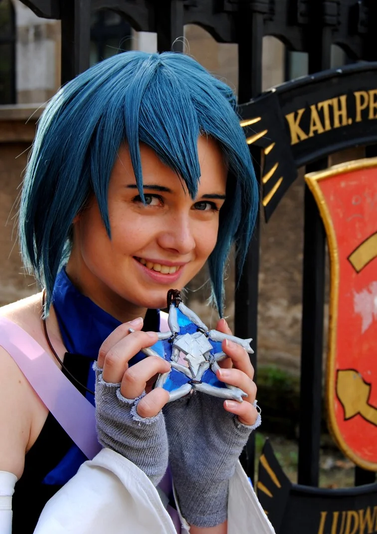 Cosplay-Cover: Schlüsselschwertmeister Aqua