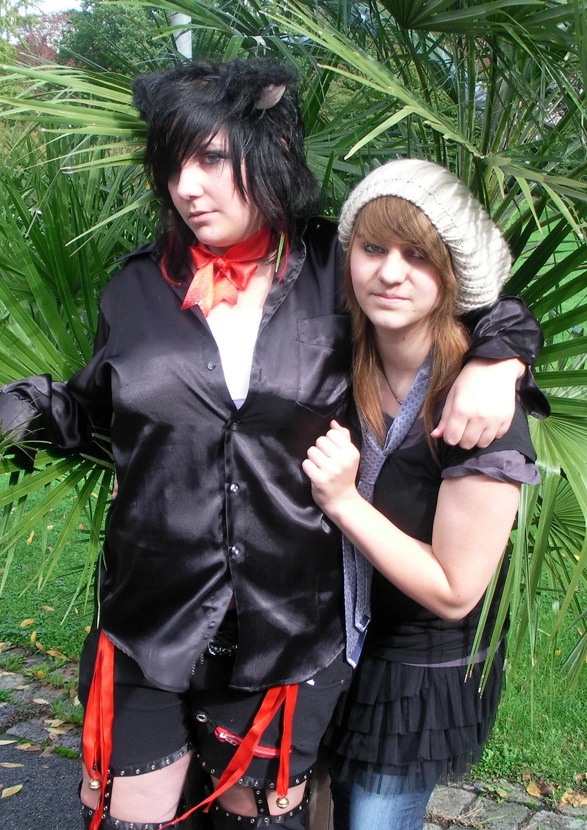 Cosplay-Cover: Catgirl im emooutfit